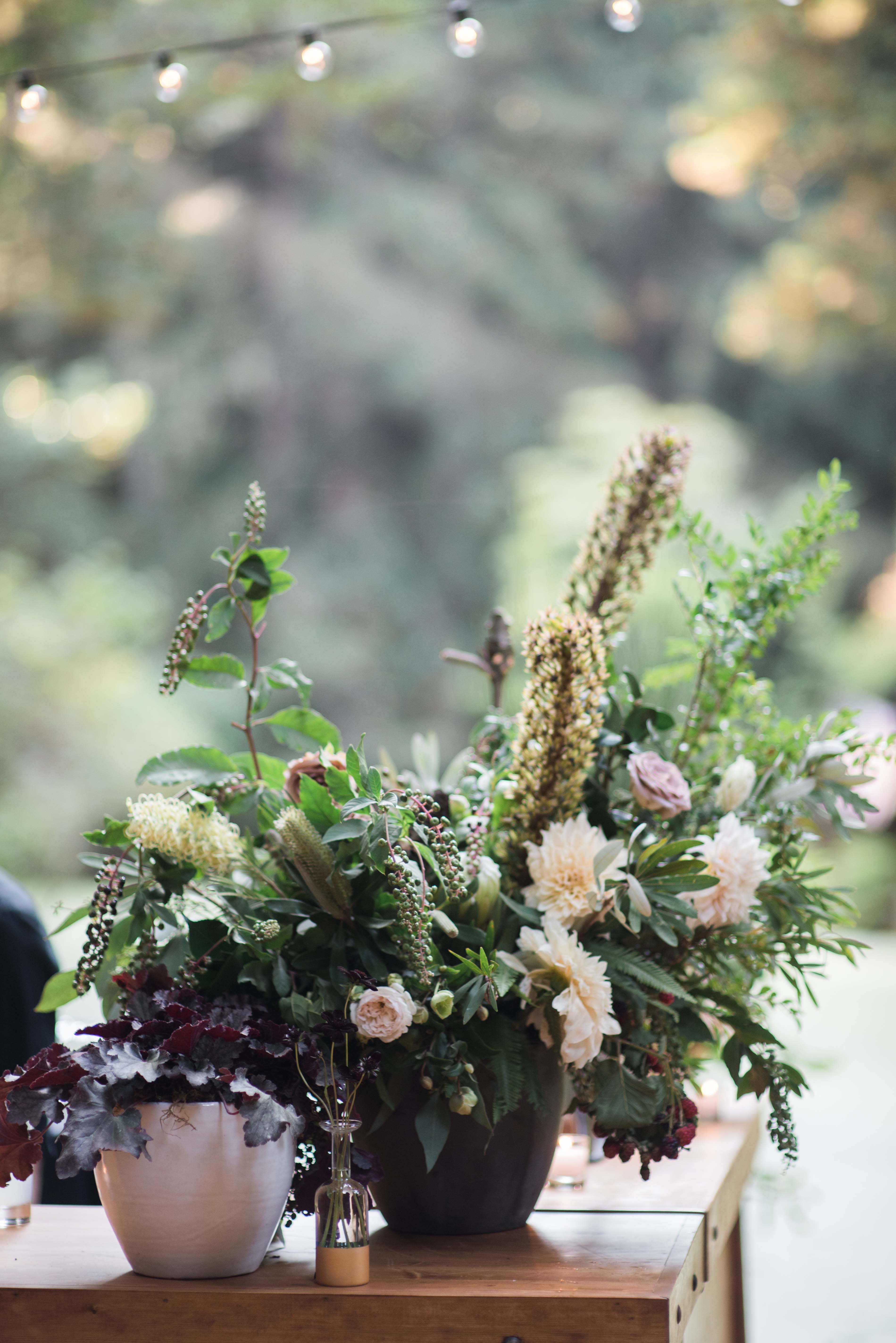 Asymmetrical florals, dusty rose and burgundy flowers - How to use your wedding color palette in a different season - Leah E. Moss Designs - Photo: Christina Richards Photography; Planning: Cassy Rose Events